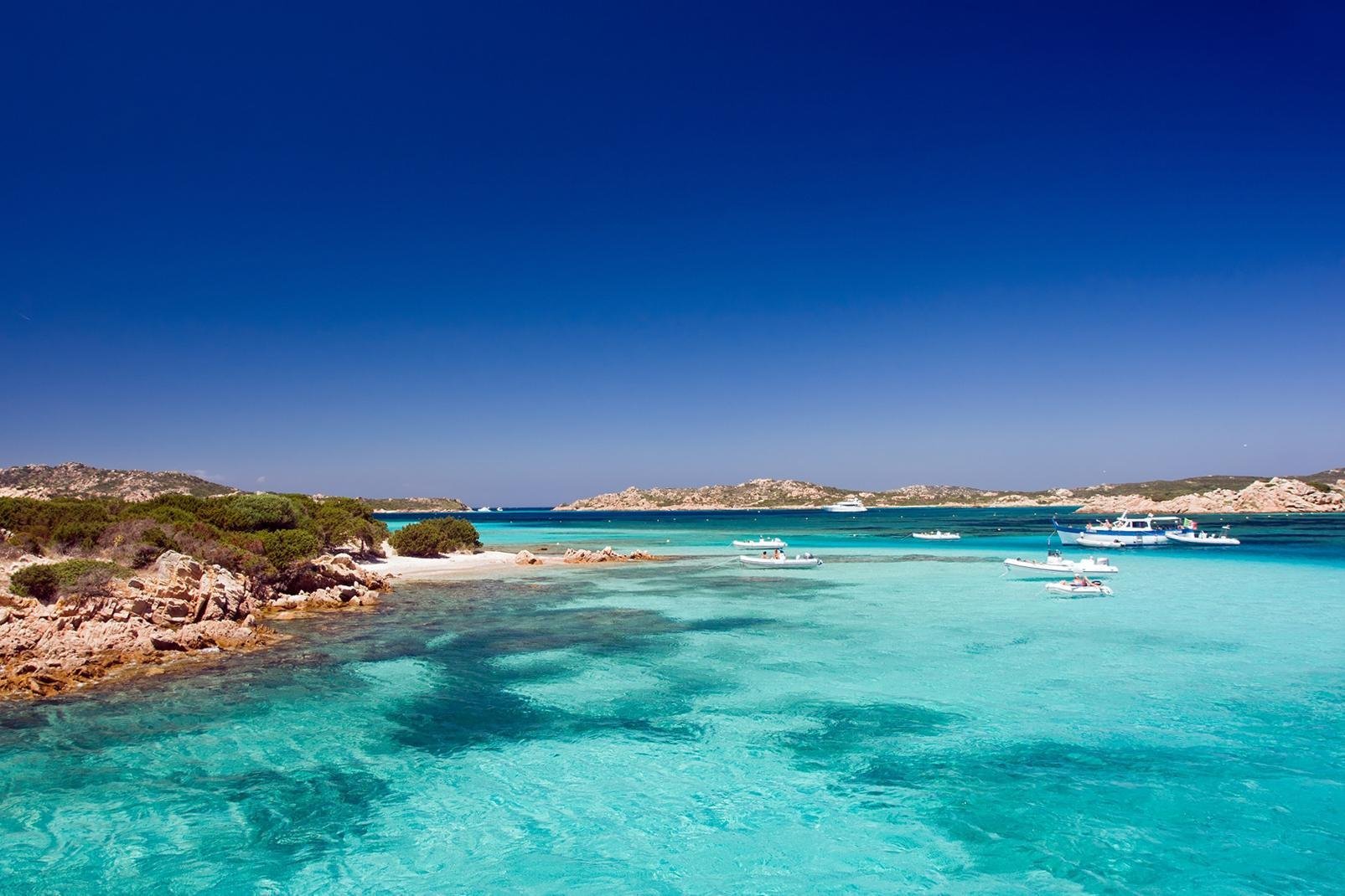 To the north-west of Sardinia, opposite the famous Costa Smeralda, an archipelago named Maddalena stretches out across a protected area of 12,000 ha. Classed as a national park since 1994 the seven islands (Maddalena, Caprera, Spargi, San Stefano, Budelli, Razzioli and Santa Maria) and numerous islets are usually visited by tourists during a day's excursion. The granite rocks and white sand beaches ...