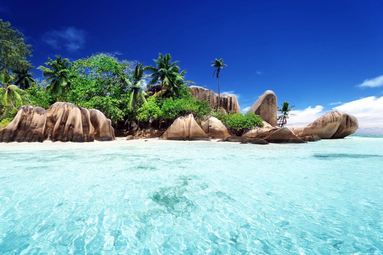 La Digue is unquestionably one of the most unforgettable islands of the Seychelles. Connected by boat or helicopter, this big rock 3 miles long and 3 km wide can be the reason for a day trip from Praslin. Once there, for travelling around you should opt for walking, using a bike or travelling by horse and cart, a means of transport that is just as picturesque as touristy. Because apart from a few rare ...