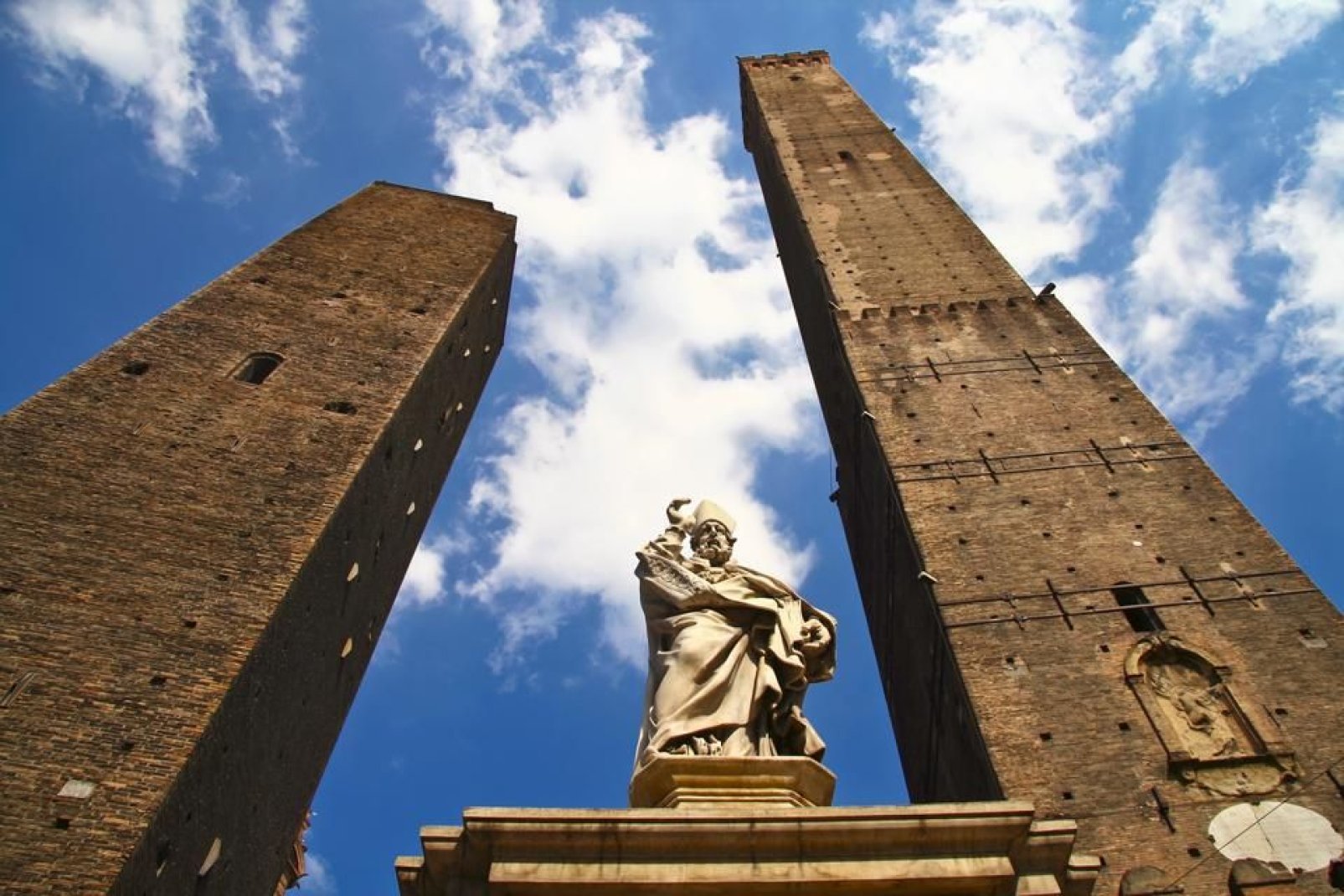 The Two Towers are the symbol of the city: the Asinelli Tower and the Garisenda Tower were commissioned by Ghibelline nobles in the 12th century.